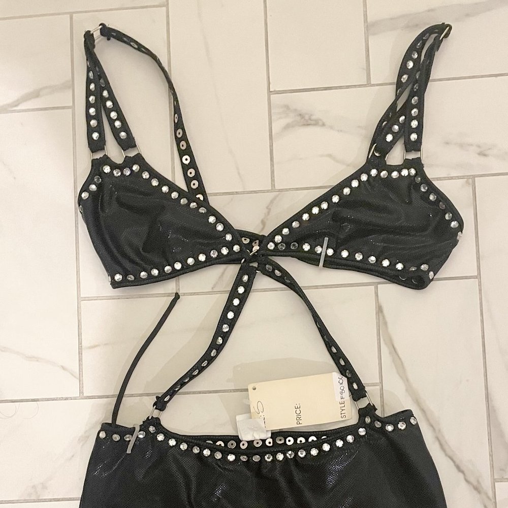 Women's black dress costume with silver grommets